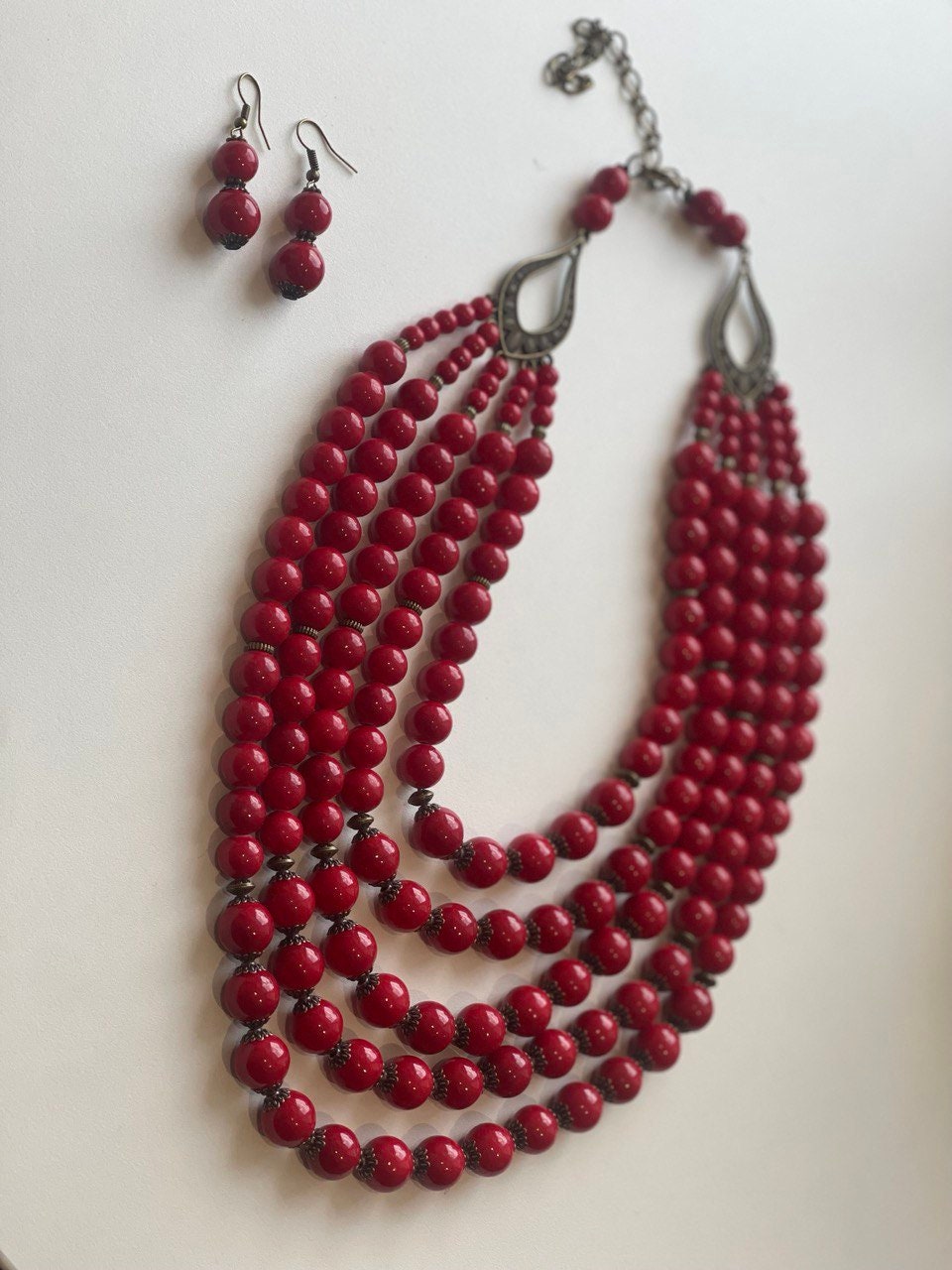 Handmade Ukrainian necklace with red pressed coral beads and matching earrings, traditional ethnic Hutsul jewelry, 2025 collection.