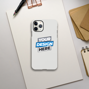Glossy iPhone case with customizable design, dual-layer protection, and wireless charging compatibility on a desk.