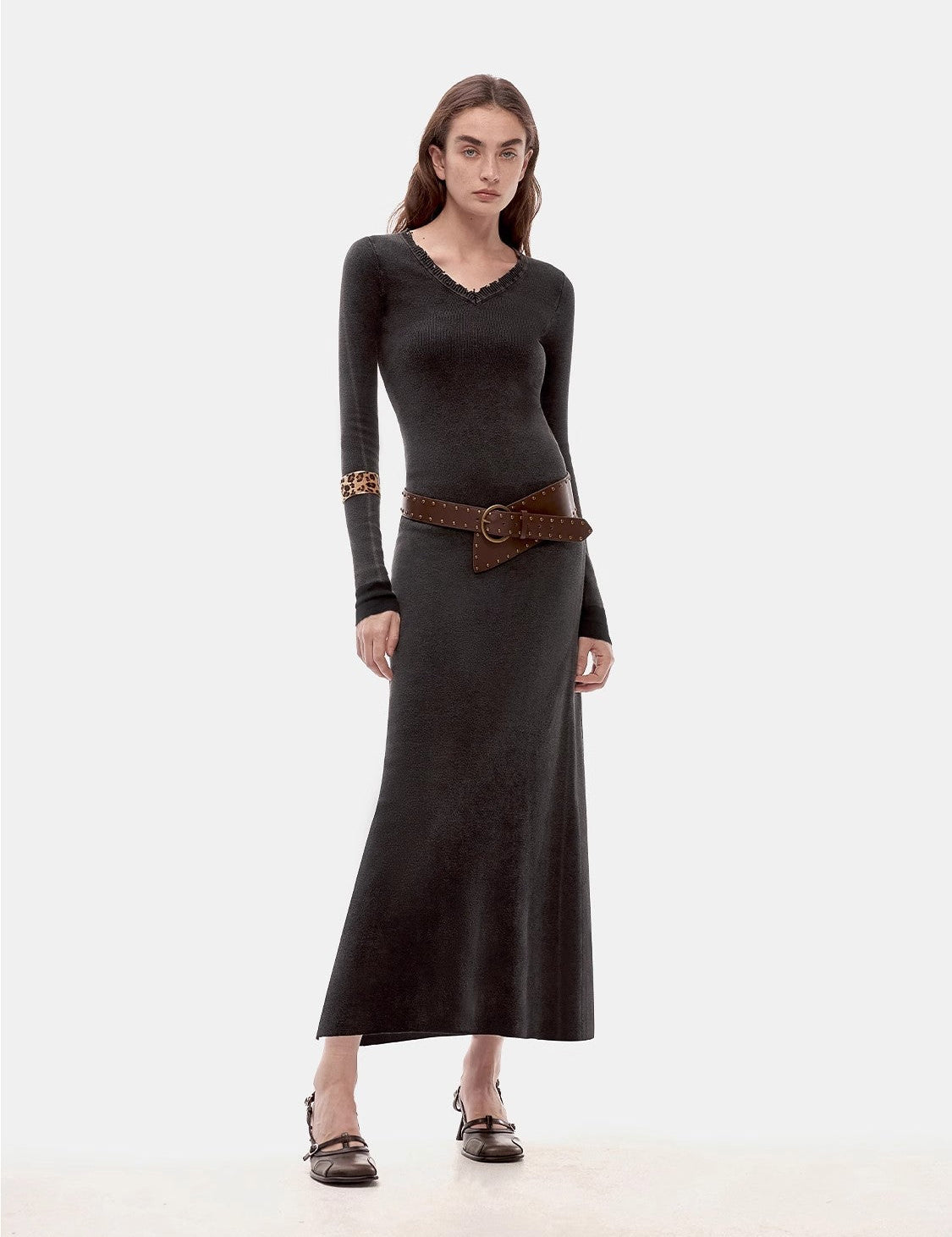 Selvara Distressed Cotton V-Neck Dress with raw-cut neckline, vintage character, and contrast-tipped cuffs, worn by a model.