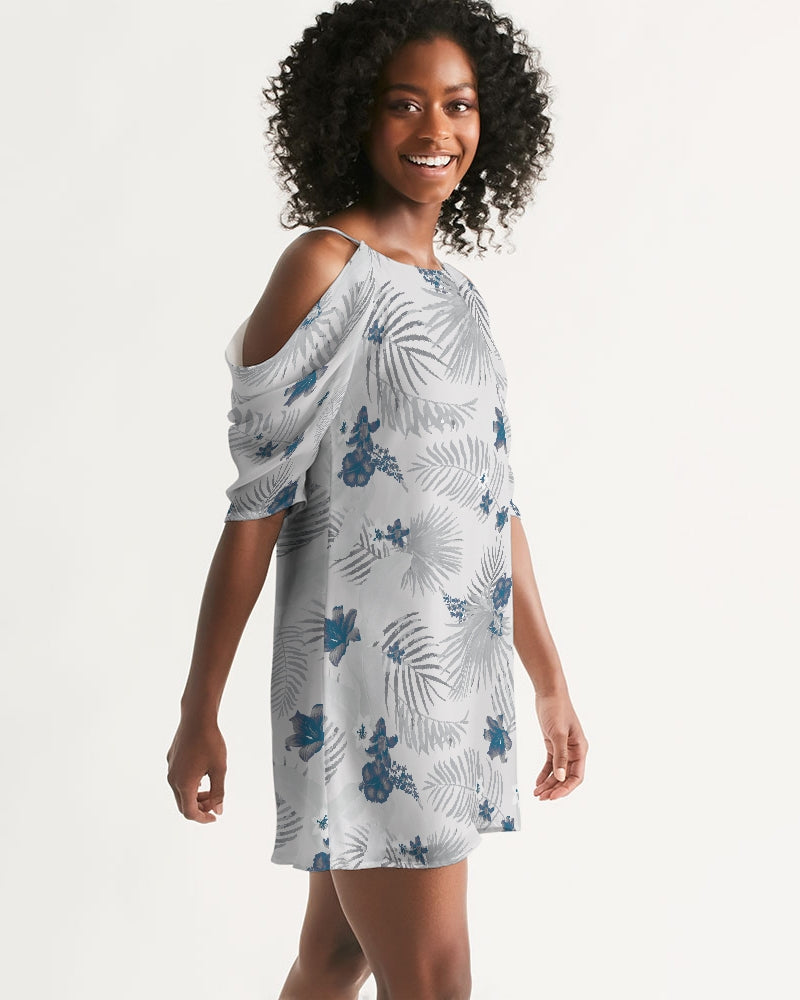 Woman wearing Palm Soul open-shoulder A-line dress with island palm print, flutter sleeves, and relaxed fit, perfect for summer.
