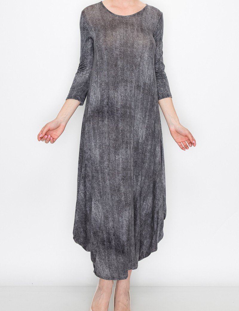 4 sleeves and round neckline, showcasing soft fabric and artistic design for relaxed comfort.