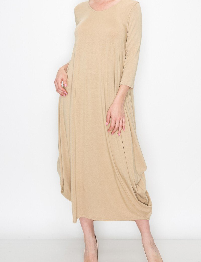 4 sleeves and flowy design, showcasing casual comfort in soft fabric, perfect for any occasion.