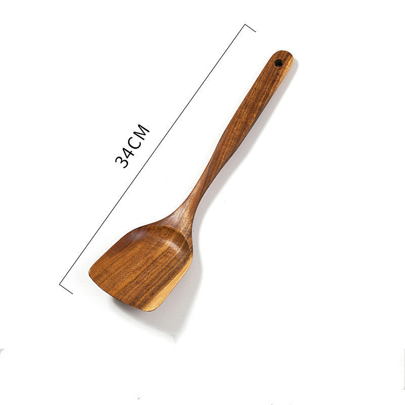 Teak unlacquered solid wood spatula for wok cooking, non-stick, 34cm length, ideal for stir-fry dishes.