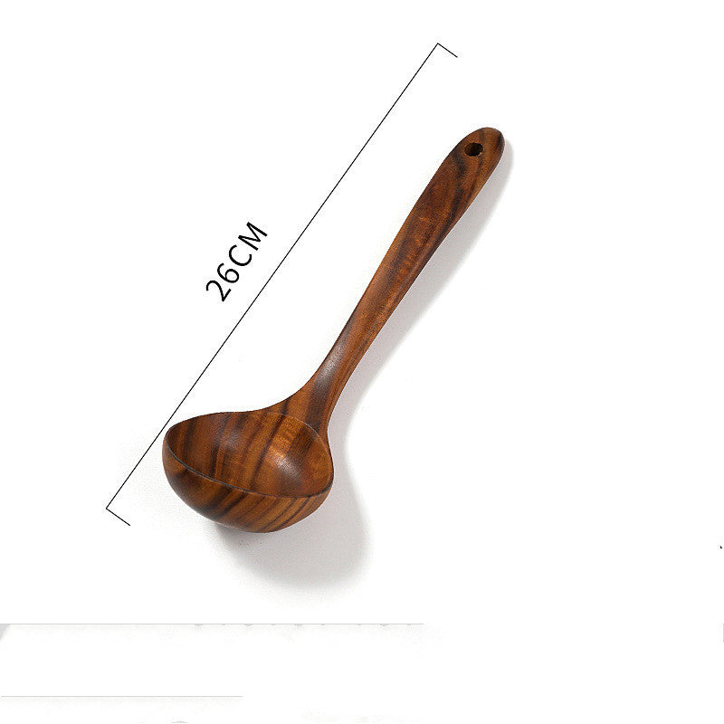 Teak unlacquered solid wood spatula with non-stick surface, ideal for stir-frying in woks, shown with 26cm length measurement.