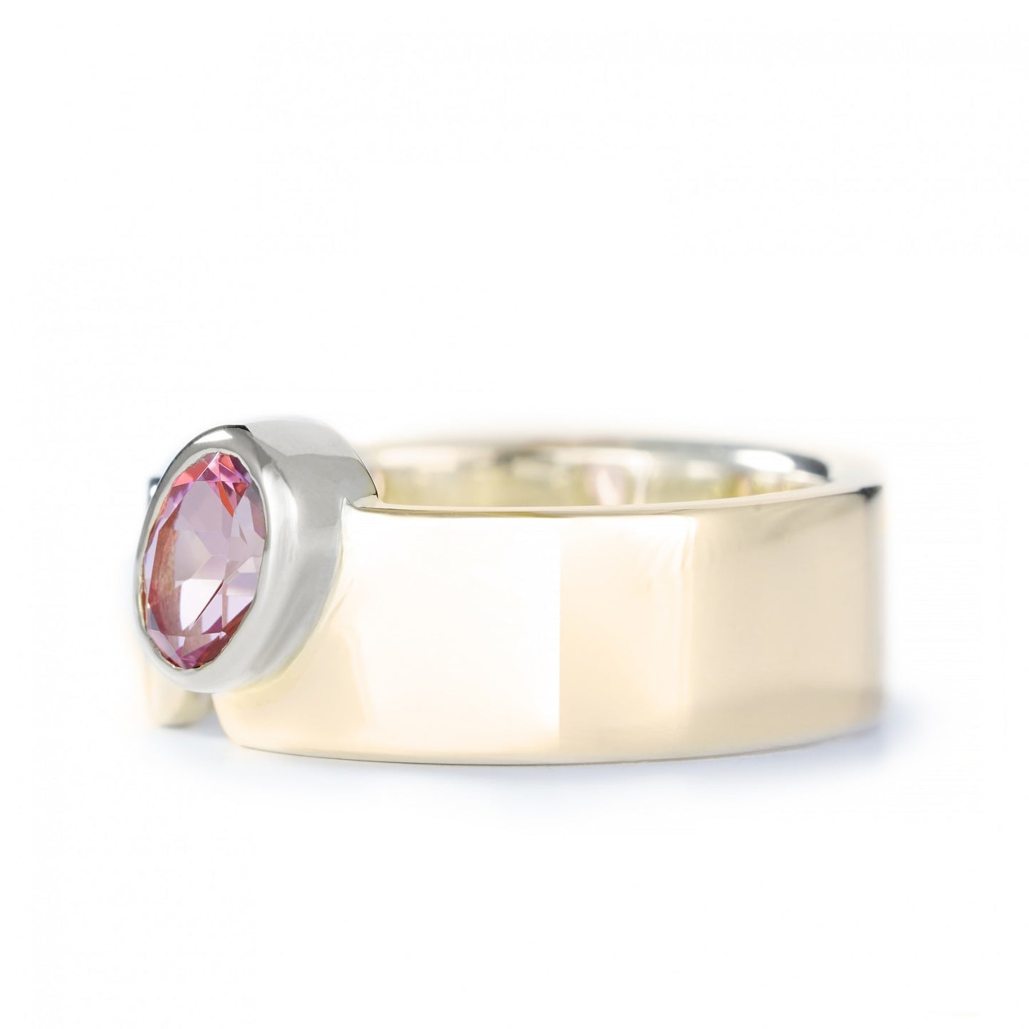 Elegant "Blush Serenity" ring in 14K gold with a pink topaz gemstone, blending yellow and white gold for a sophisticated look.