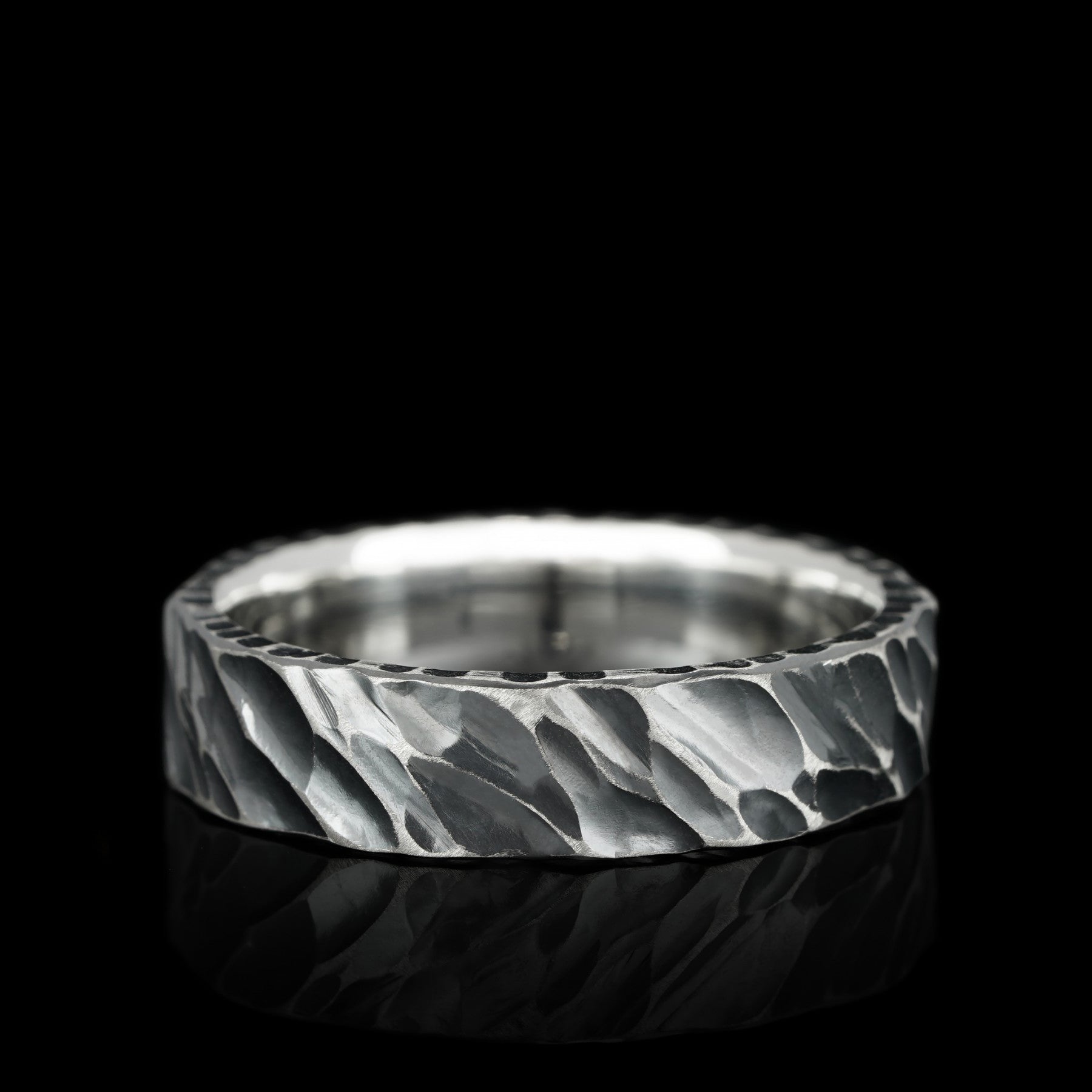 Handcrafted Iron Edge ring with textured sterling silver, bold oxidized finish for rugged elegance.