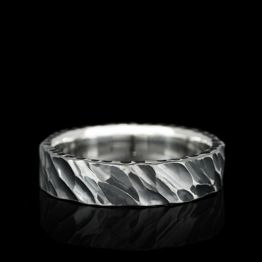 Handcrafted Iron Edge ring with textured sterling silver, bold oxidized finish for rugged elegance.