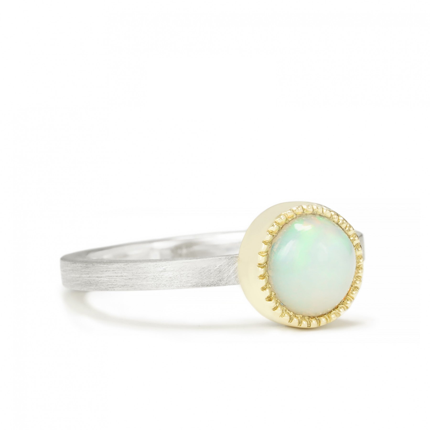 Sterling silver and 14K gold "Cosmic Horizon" ring with 7mm opal, celestial-inspired design for artistic jewelry lovers.