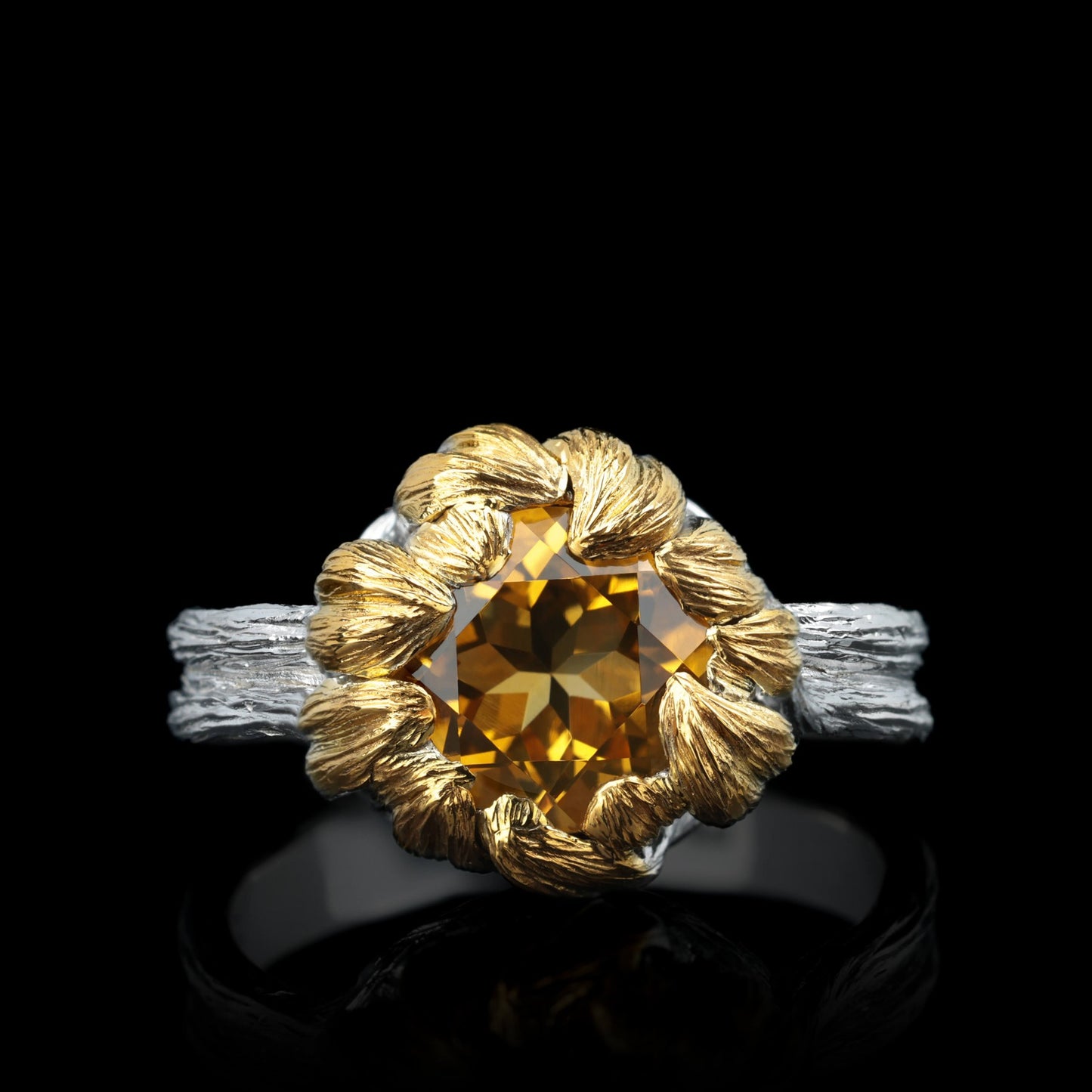 Golden Blossom ring with citrine center, inspired by peony petals, crafted in sterling silver with white rhodium and gilding.