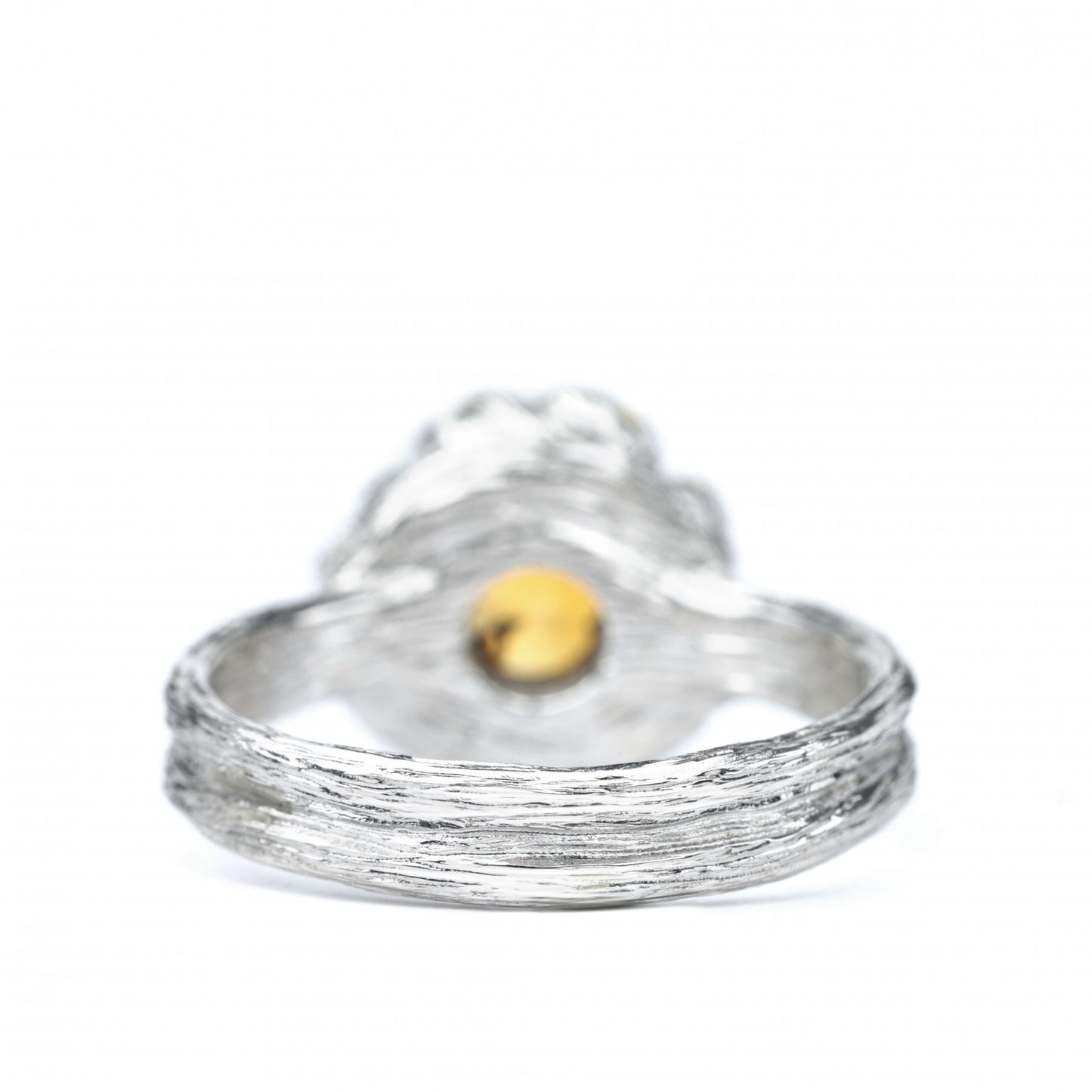 Sterling silver "Golden Blossom" ring with citrine center, inspired by peony petals, symbolizing nature’s beauty and prosperity.