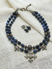 2025 Blue Ukrainian Necklace 'Magic of the Night' with sodalite stones and bronze accents on burlap fabric.