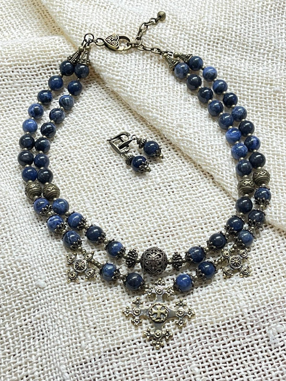 Multilayer Ethnic Necklace "Magic of the Night" with Sodalite, Bronze Accents, Ukrainian Handmade Jewelry on Display