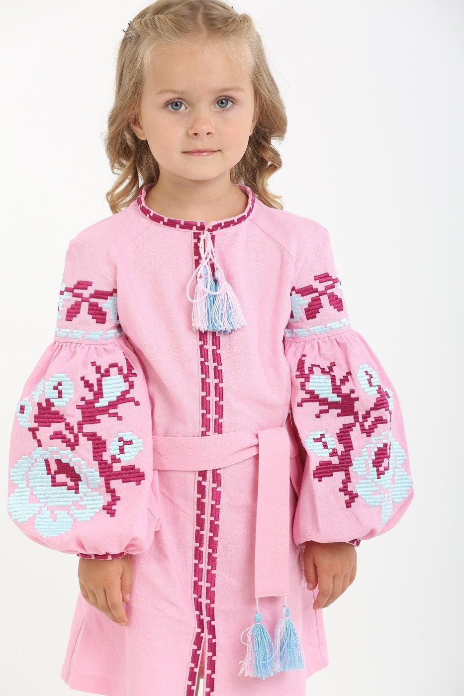 Pink linen embroidered dress for girls with Ukrainian vyshyvanka floral cross-stitch pattern, 2025 collection.
