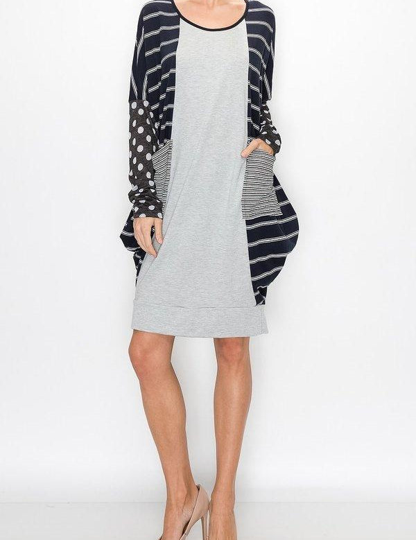 Kylara Color-Block Balloon Dress with bold panels, long sleeves, and patch pockets, offering a stylish and casual everyday look.