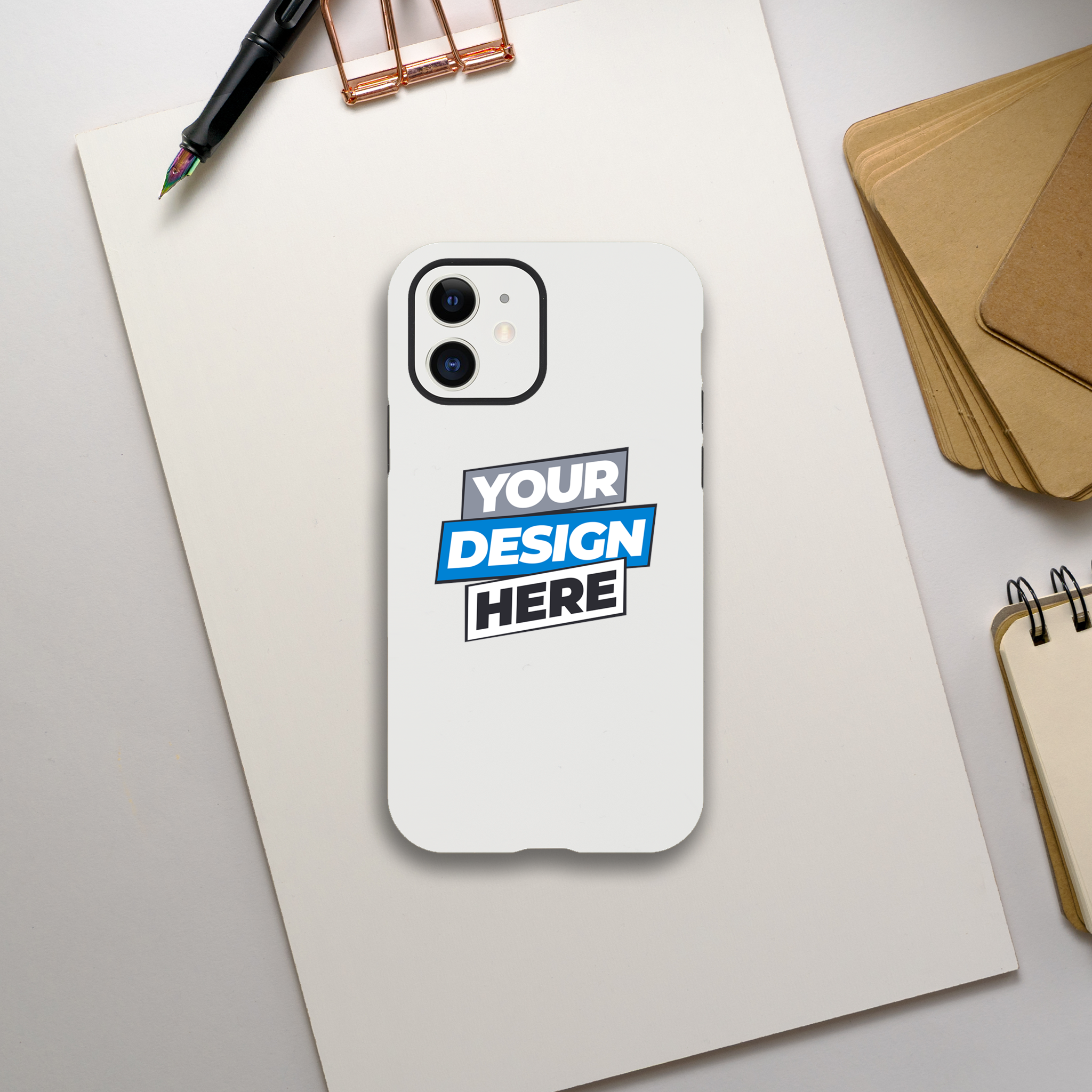 Custom design gloss tough iPhone case on desk, featuring dual-layer protection and compatibility with wireless charging.
