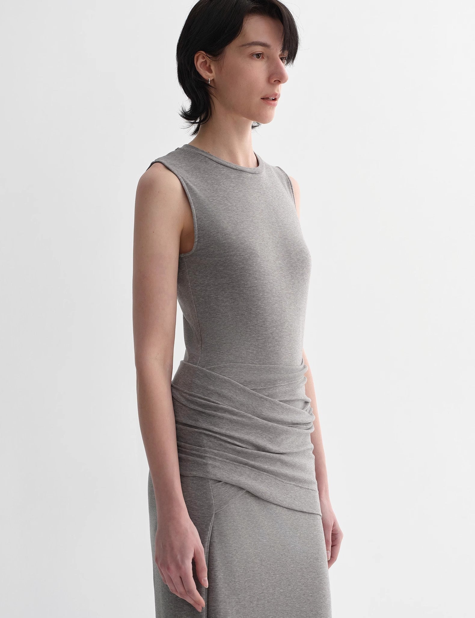 Urban Sculpt wool blend midi dress with round neckline and tailored fit, showcasing minimalist style and elegant drape.