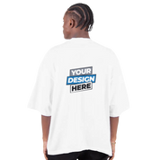Back view of a model wearing a white oversized drop-shoulder t-shirt with a customizable design print area.