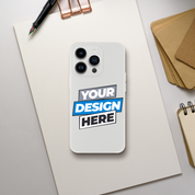 Transparent Flexi Case on desk, perfect for art display. Impact resistant, tear-resistant, and wireless charging compatible.
