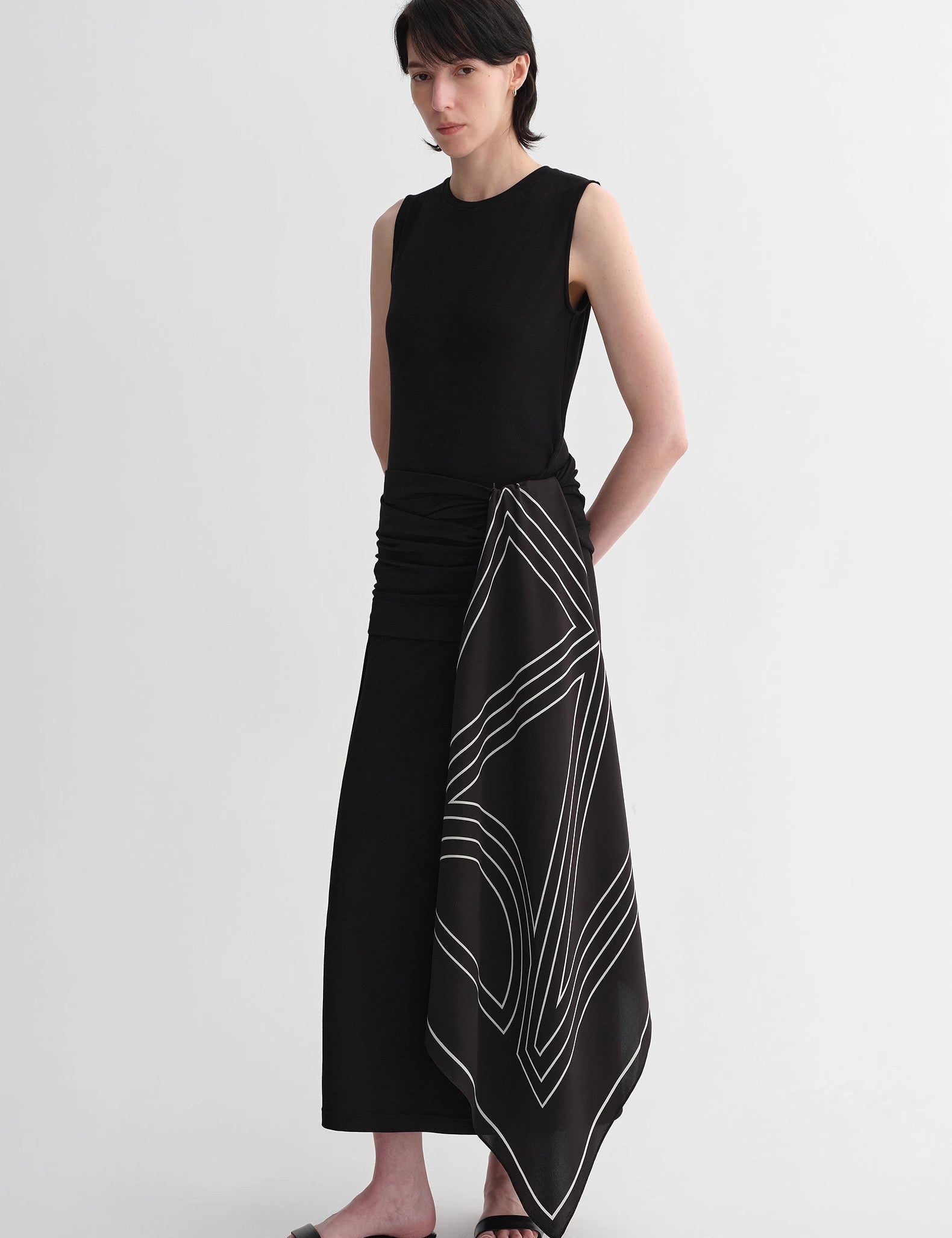Minimalist Urban Sculpt Wool Blend Midi Dress with graphic scarf detail, highlighting its elegant silhouette and premium fabric quality.