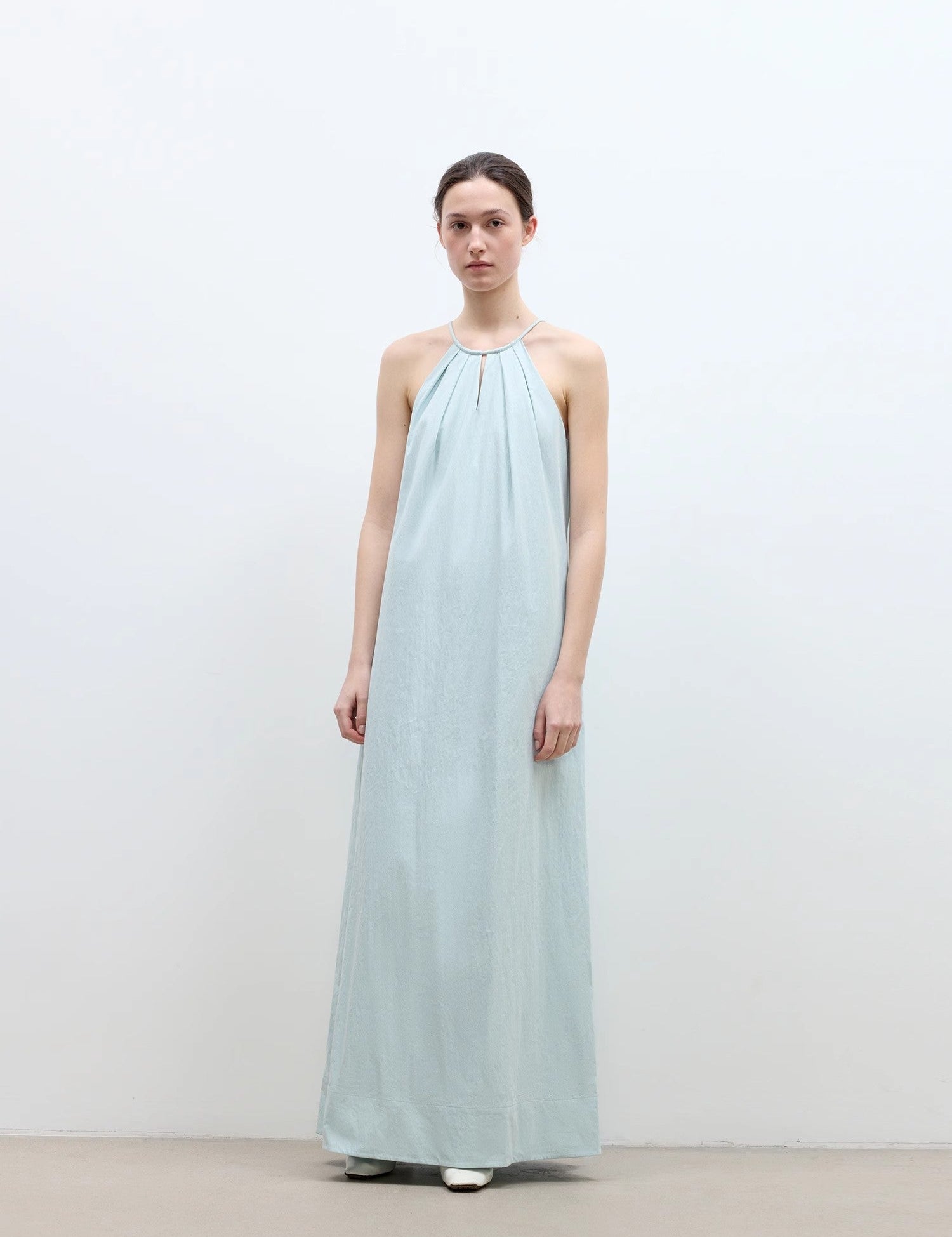 Light blue Veridia Halter-Pleat Maxi Dress with cotton-rope halter and pleated neckline, featuring a flowing skirt for elegant style.