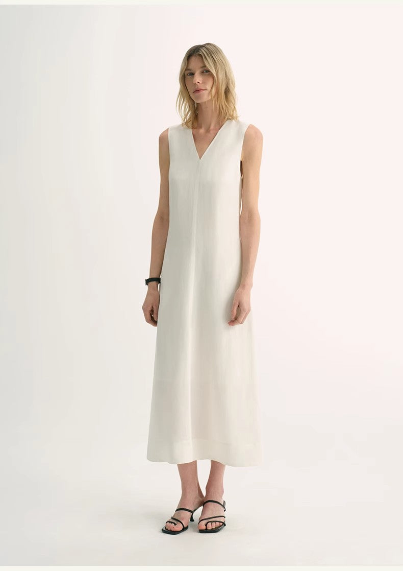 Aurevae Cupro-Linen A-Line Dress featuring a clean V-neck and sleeveless bodice, mid-calf length, in light breathable fabric with subtle sheen.