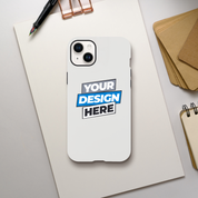 Glossy print on demand iPhone case with dual-layer protection and customizable design on a desk.