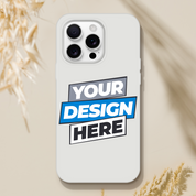Customizable Flexi Case with 'Your Design Here' graphic, transparent and impact-resistant with precise cutouts, suitable for modern phones.