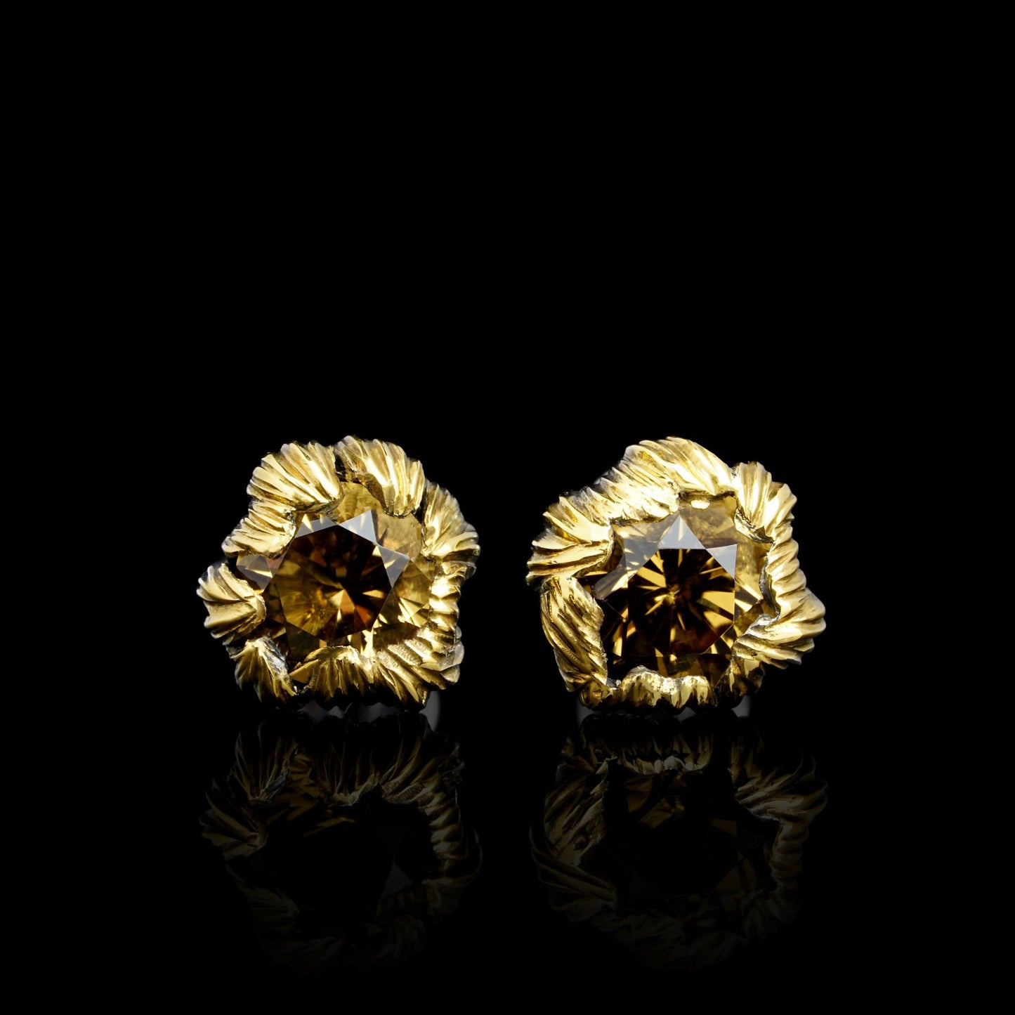 Golden Petals earrings with citrines and gilded petals on a black background, inspired by peonies, handcrafted in sterling silver.