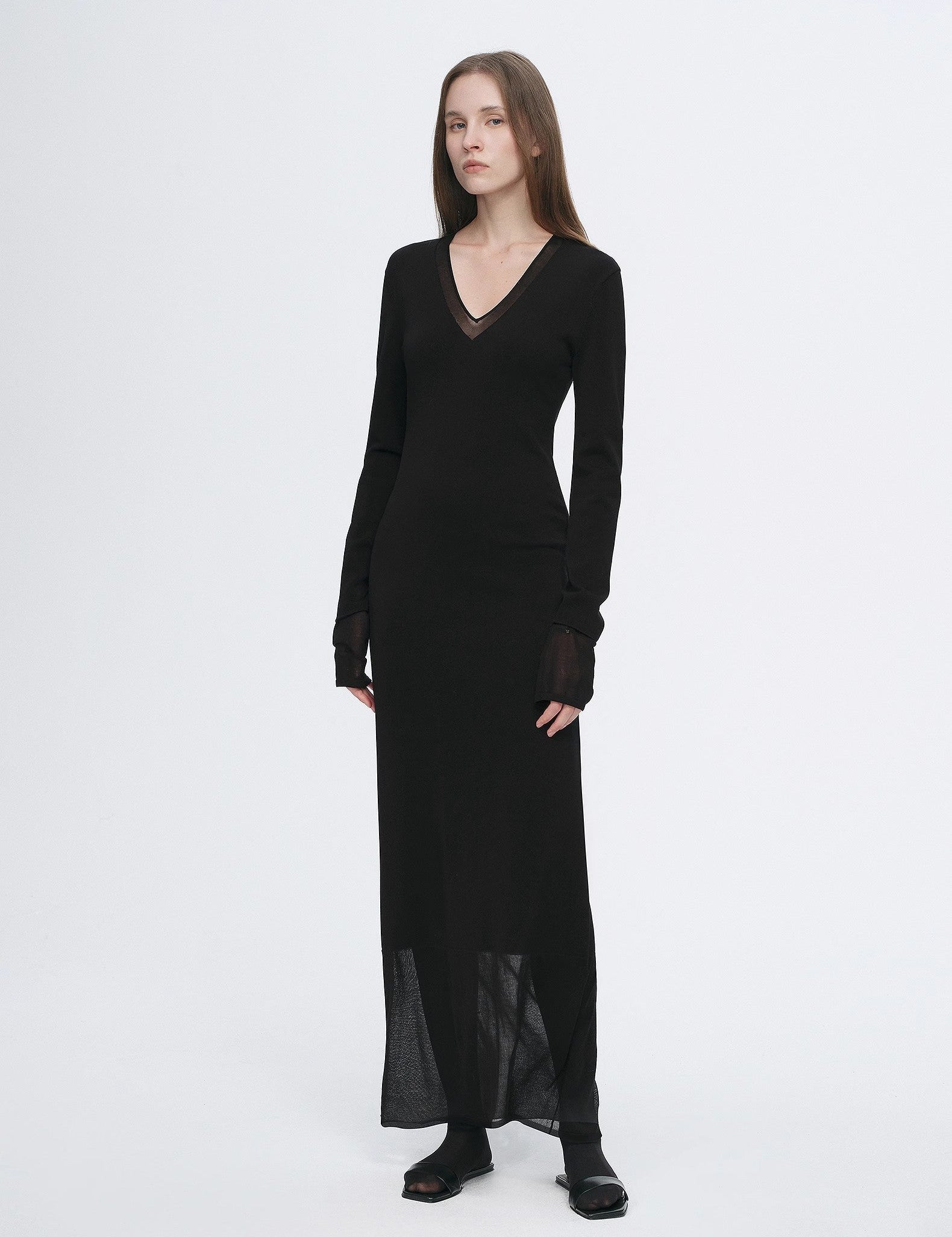 Virella Mesh-Splice V-Neck Dress in black with A-line cut and sheer mesh panels for a refined, modern look.