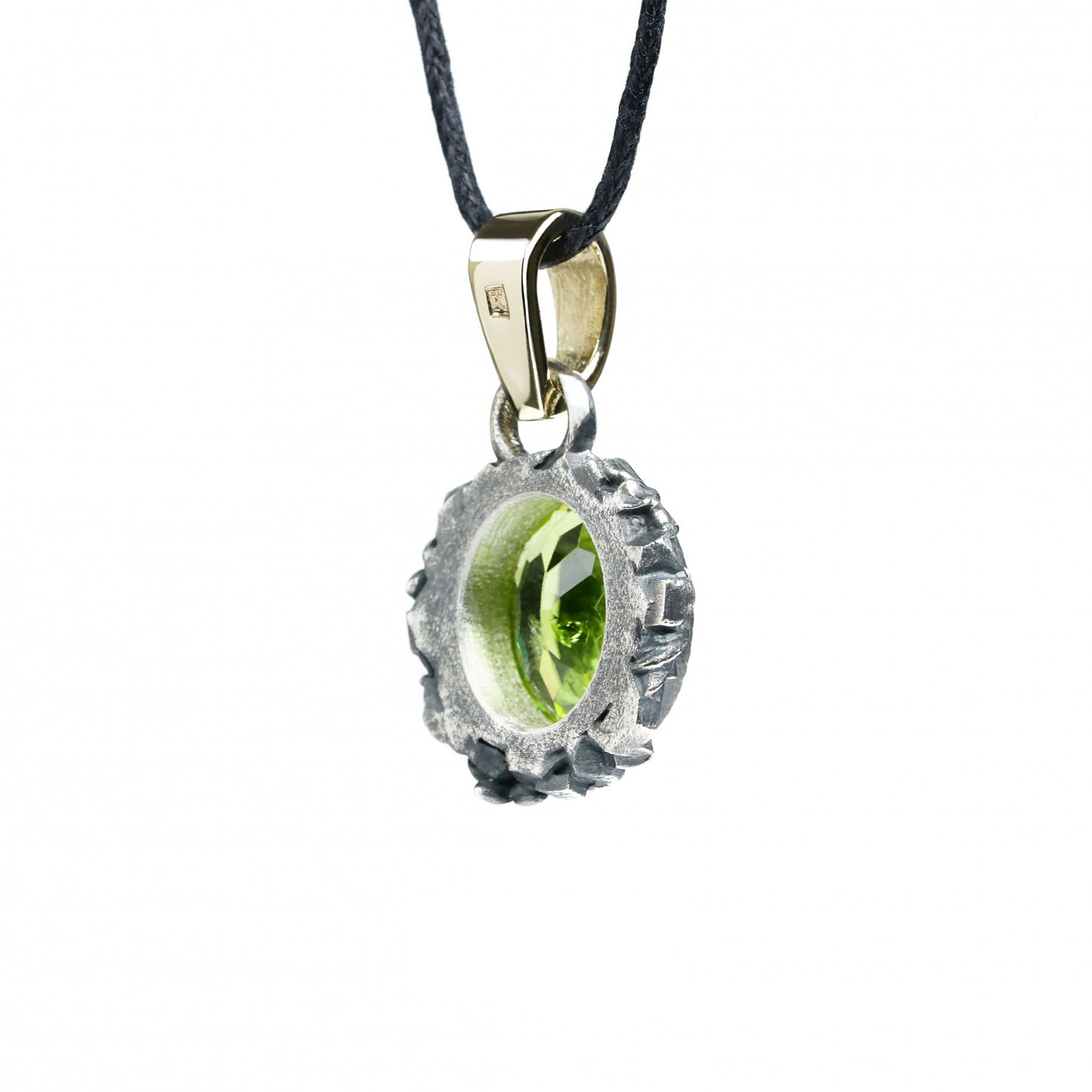 Enchanted Bloom Pendant in oxidized sterling silver with peridot and 14K gold clasp, featuring intricate floral details.