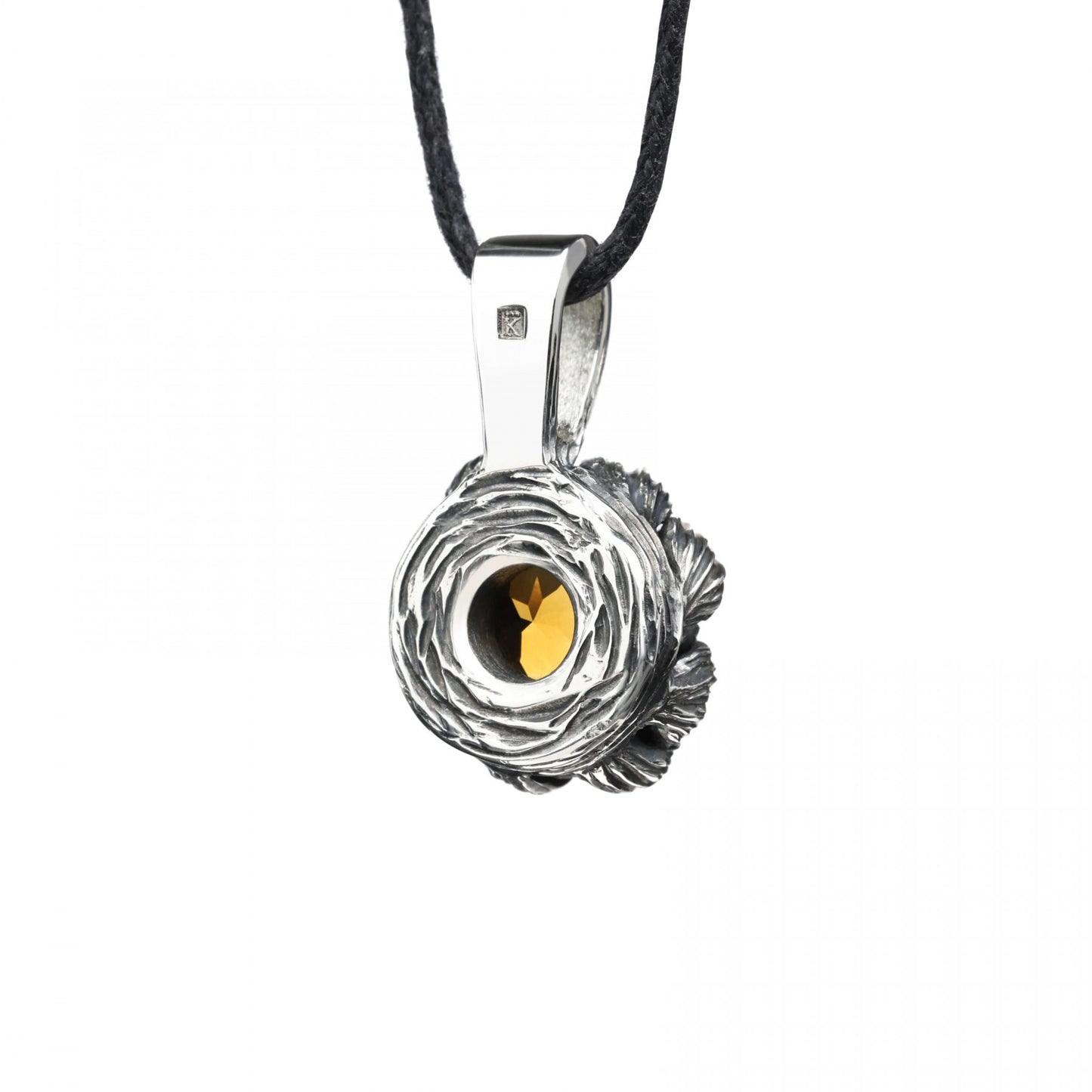 Sterling silver "Golden Bloom" pendant with citrine gemstone centerpiece, inspired by peony petals, symbolizing growth and elegance.