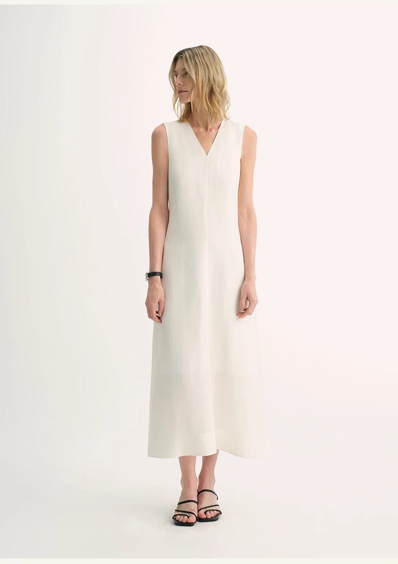 Aurevae Cupro-Linen A-Line Dress with V-neck, sleeveless bodice, mid-calf length, subtle sheen, and breathable fabric.