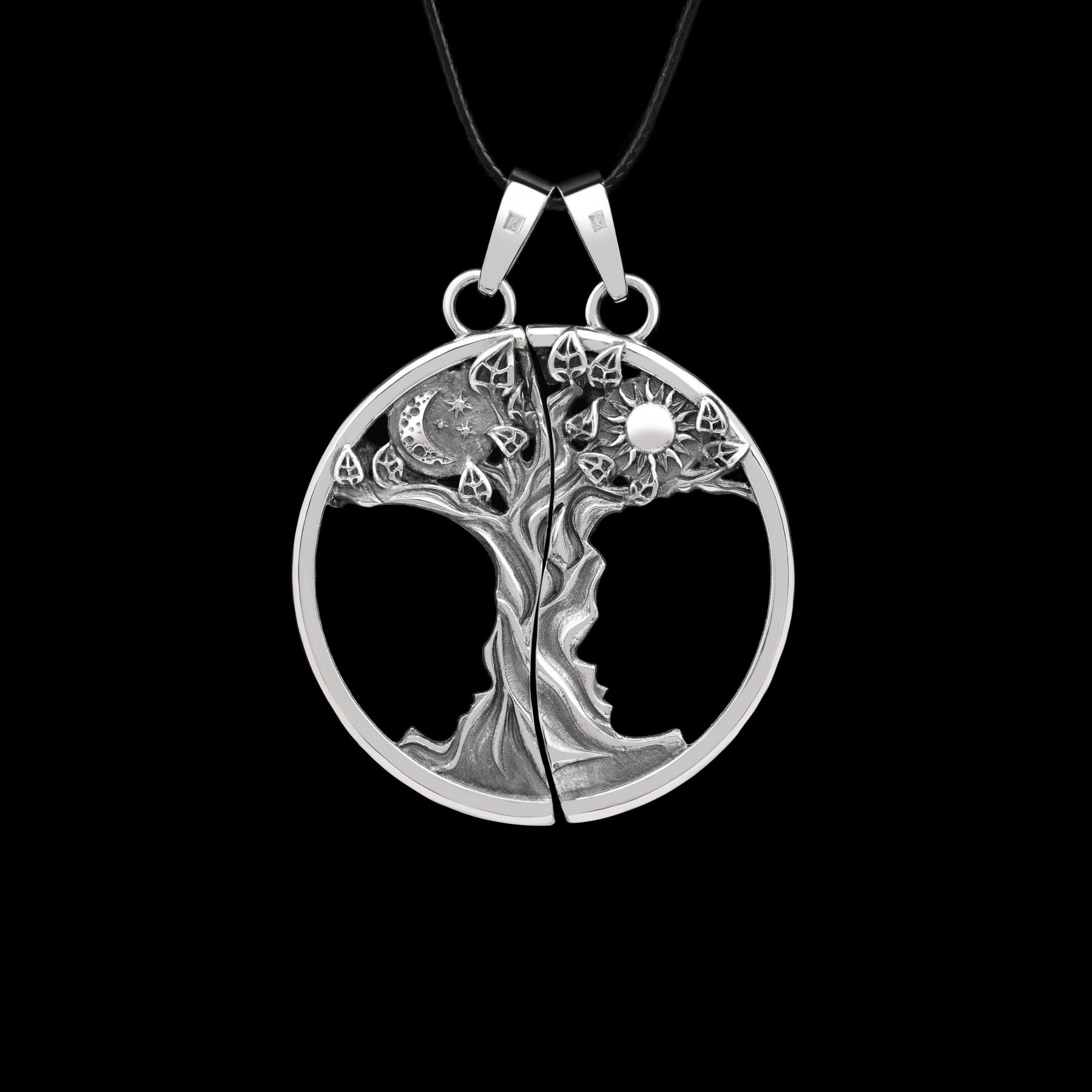 Double Pendant "Primal Bond" in oxidized sterling silver, featuring an intricate double-disc tree design symbolizing timeless love and connection.