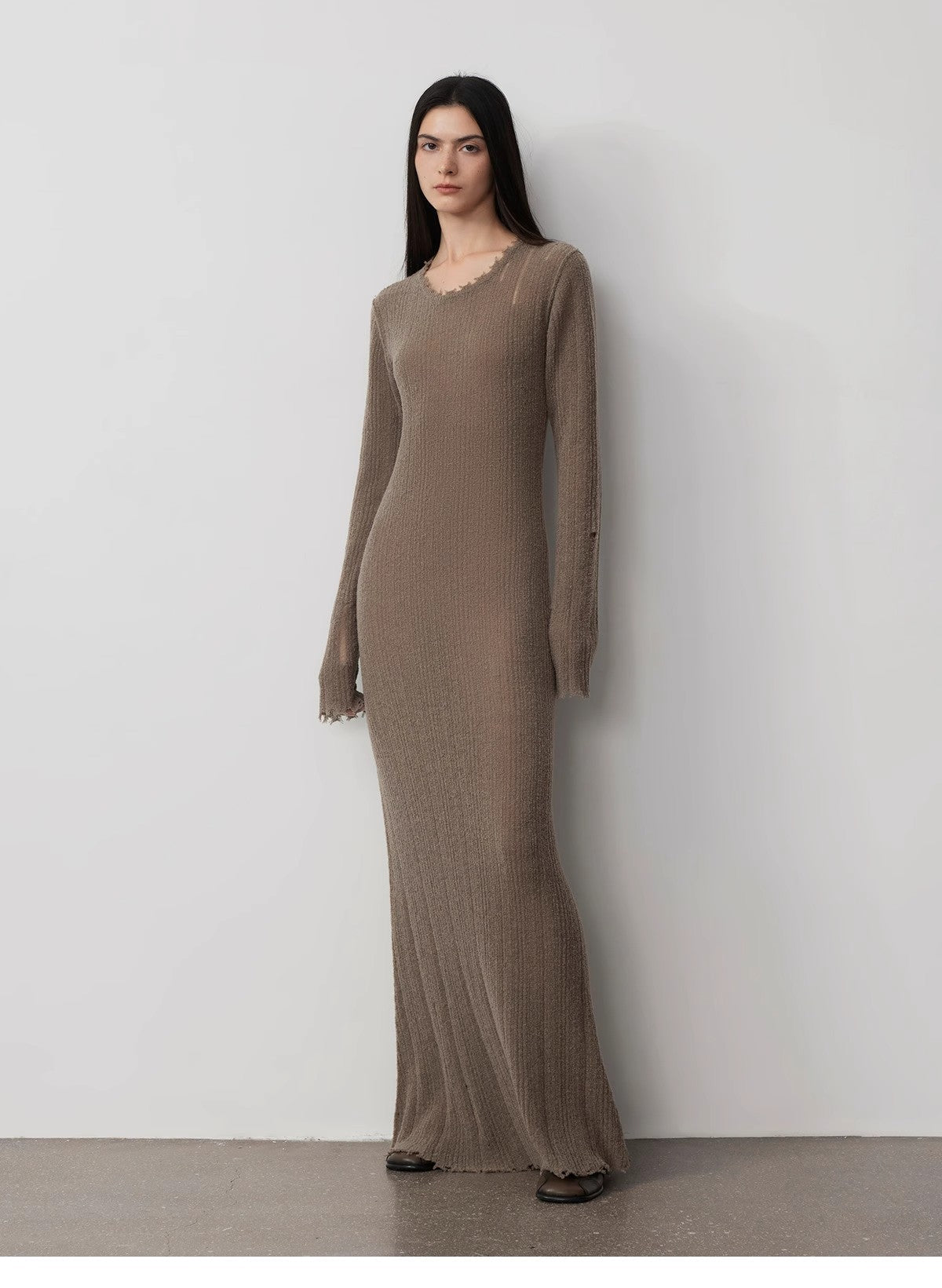 Fray Line Wool Knit Dress with frayed edges, cut-outs, and raw edge neckline, offering an edgy, sculptural look in soft looped wool.