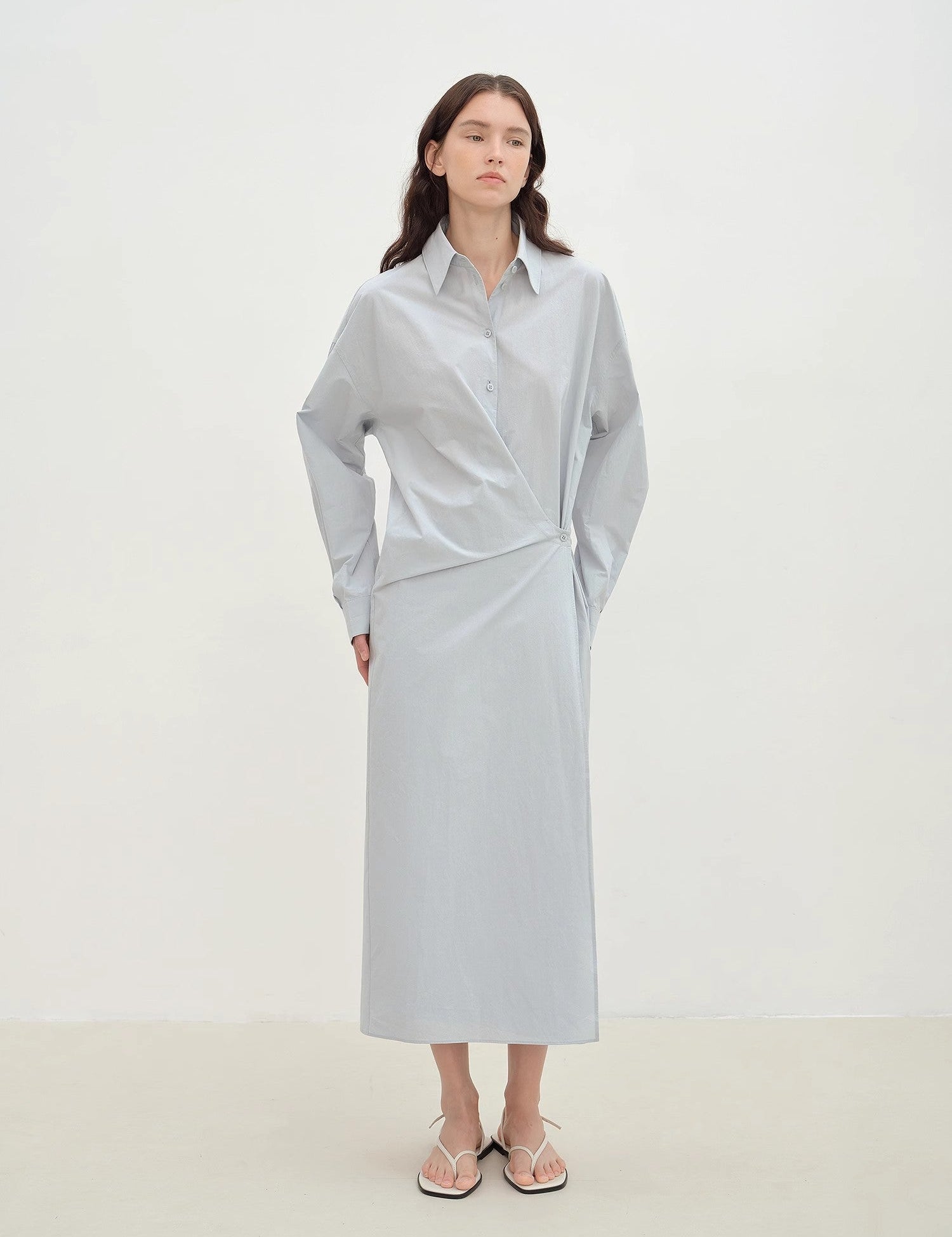 Woman wearing Whisper Wrap Cotton Shirt Dress with lapel collar and cross-placket closure, showcasing a cocoon silhouette.
