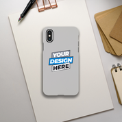 Gloss Tough iPhone Case with customizable design on paper backdrop, highlighting dual-layer protection and wireless charging feature.