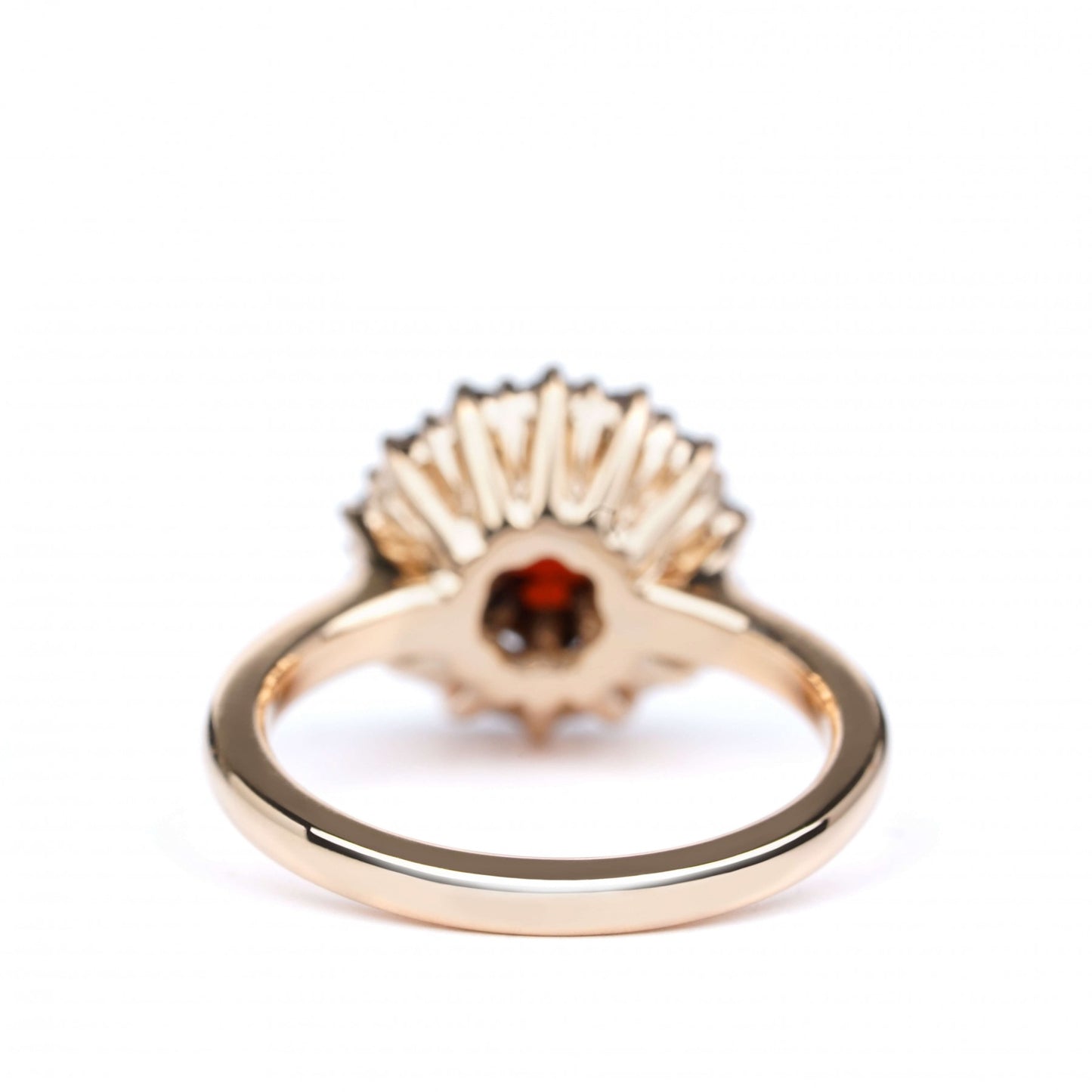 Red 14K gold Fiery Allure ring with garnet centerpiece, showcasing intricate craftsmanship and elegant design.