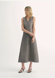 Aurevae Cupro-Linen A-Line Dress with V-neck and sleeveless design, mid-calf length, in a textured, breathable fabric with a subtle sheen.