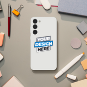 Transparent flexi phone case with custom design, surrounded by office supplies on desk.