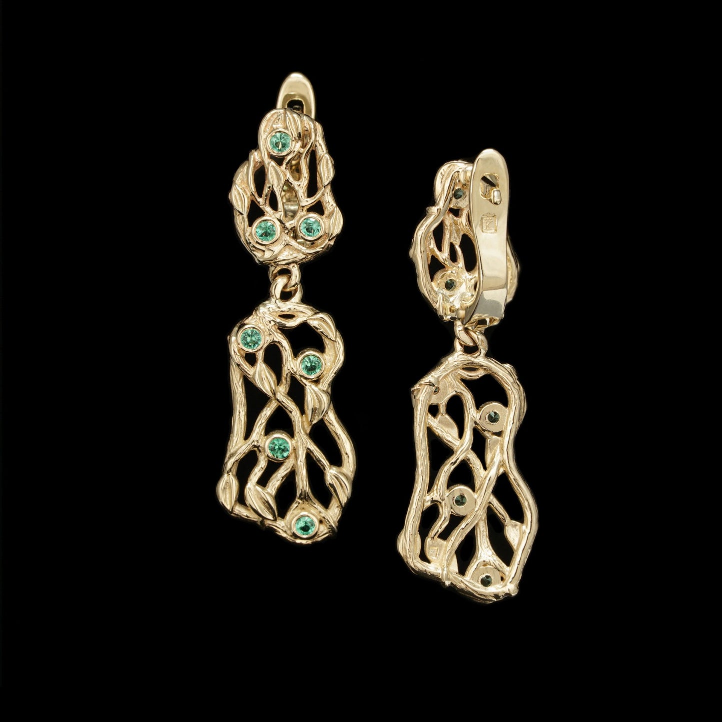 Yellow gold "Forest Whisper" earrings with emeralds, featuring a dynamic, movable design from the Forest Collection.