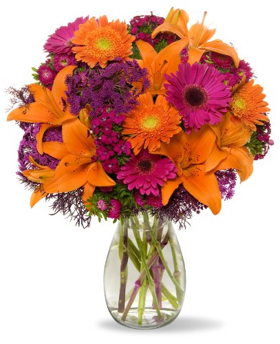 Vibrant bouquet with orange gerbera daisies, purple asters, and lilies in a vase, perfect for spring and summer celebrations.