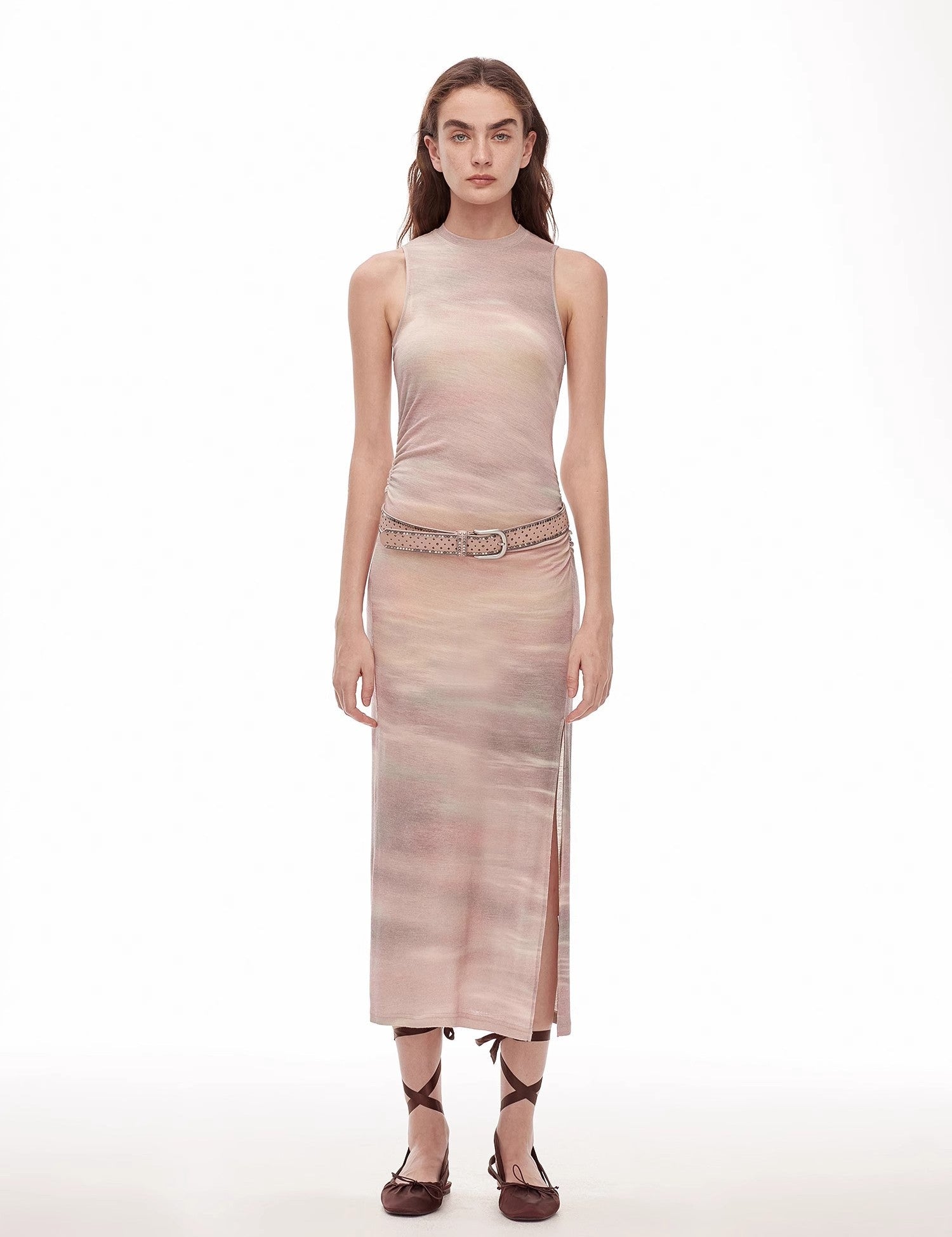 Talyra Wool-Blend Knit Maxi Dress with sleeveless column silhouette and side slit in a pastel tone, worn by a model.