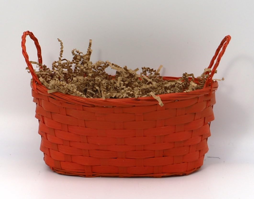 Empty orange woven basket with handles and shredded paper filling.