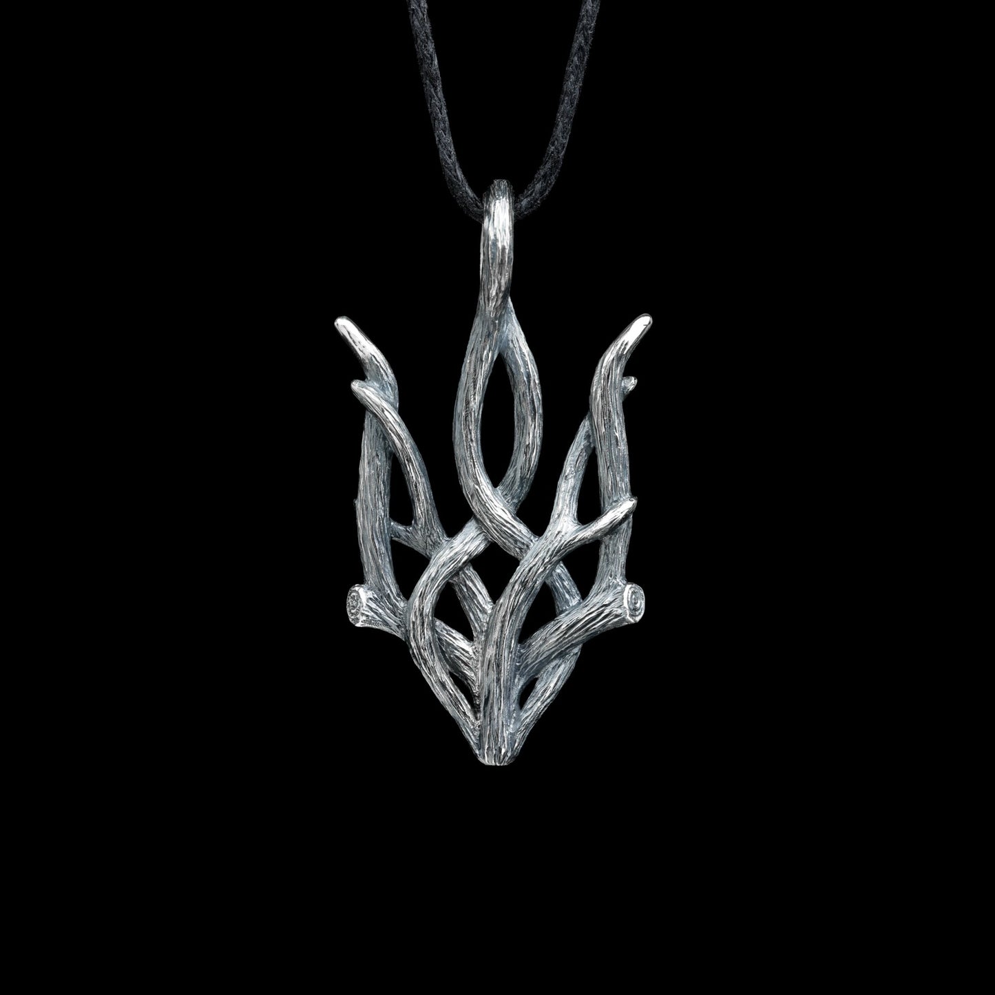 Silver Forest Trizub pendant with oxidized finish, celebrating Ukrainian heritage and nature-inspired design.