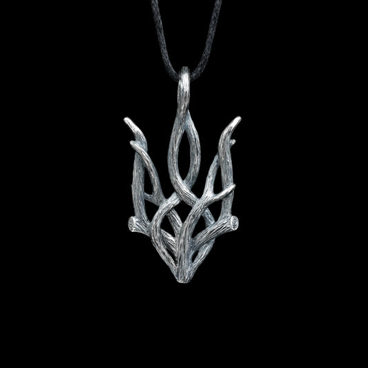 Silver Forest Trizub pendant with oxidized finish, celebrating Ukrainian heritage and nature-inspired design.