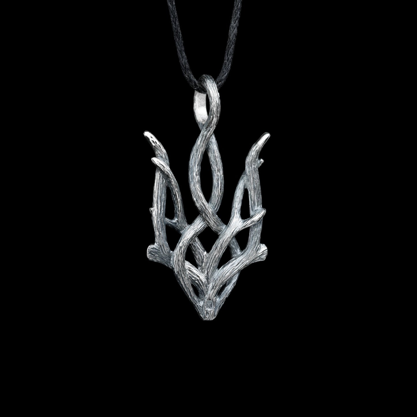 Silver "Forest Trizub" pendant with oxidized finish, inspired by nature, celebrating Ukrainian heritage and national pride.