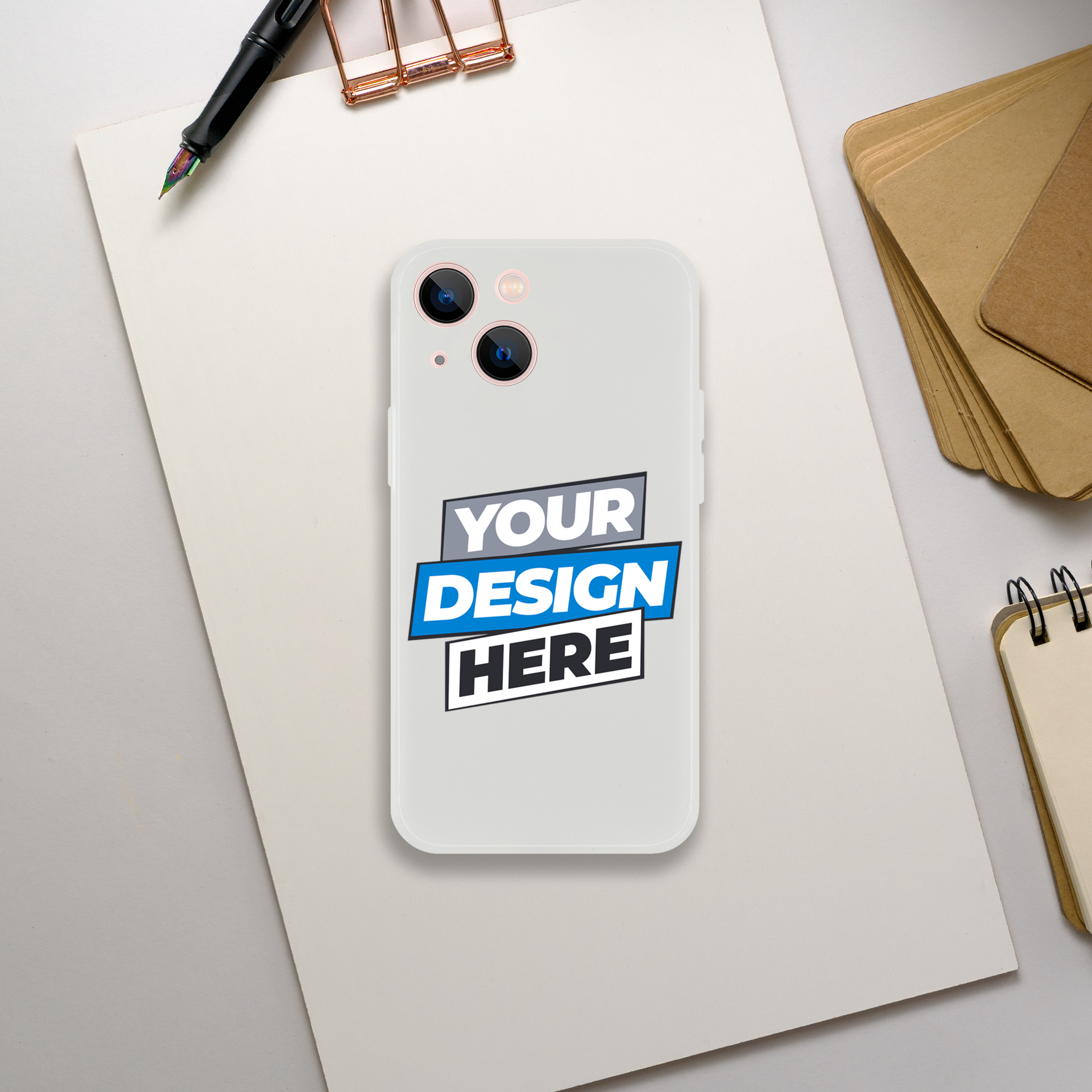 Transparent Flexi Case with customizable design on a notepad, offering impact resistance and wireless charging compatibility.