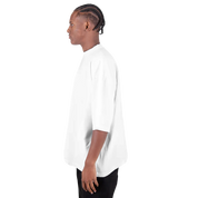 Model wearing Men's Oversized Drop-Shoulder Crewneck T-Shirt in white, side view, showcasing relaxed fit and ribbed crew neck.