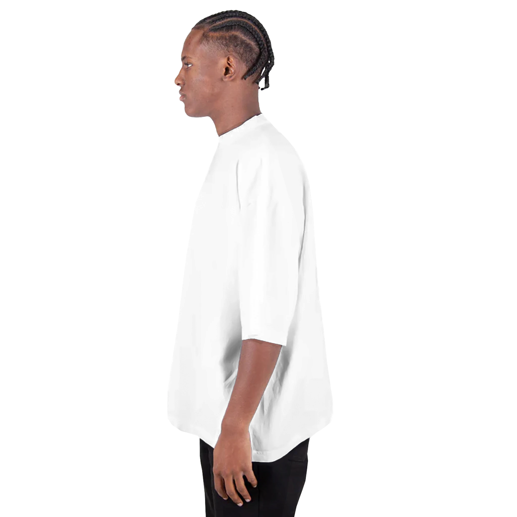 Model wearing Men's Oversized Drop-Shoulder Crewneck T-Shirt in white, side view, showcasing relaxed fit and ribbed crew neck.