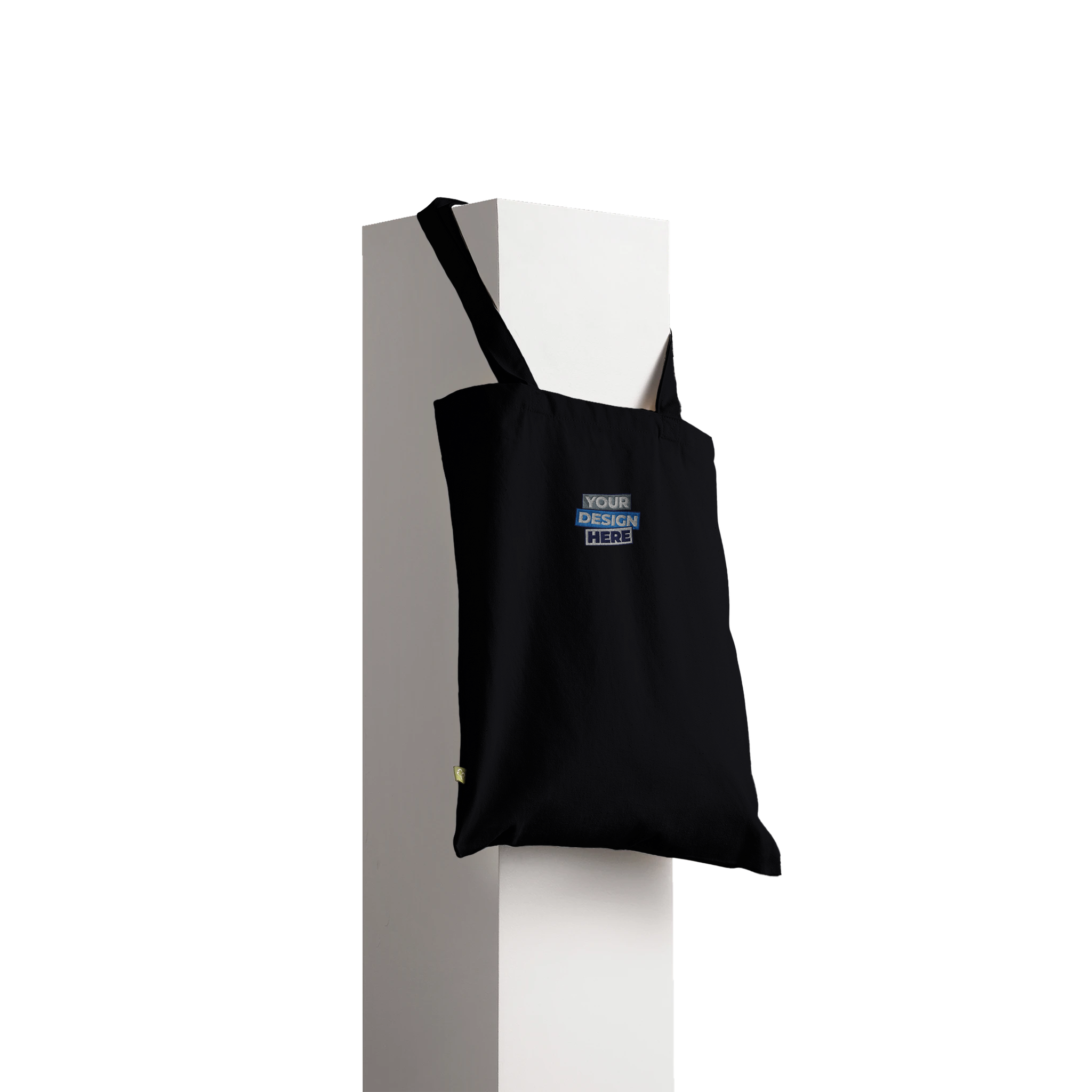 Tarselle Cotton Tote Bag displayed on stand, showcasing durable fabric and customizable print area for sustainable fashion use.